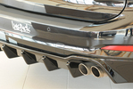Ford Focus 4 Универсал ST/ST Line 18- Накладка на задний бампер/диффузор глянцевая под фаркоп