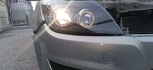 Opel Astra H Фары с линзами и ангельскими глазками черные